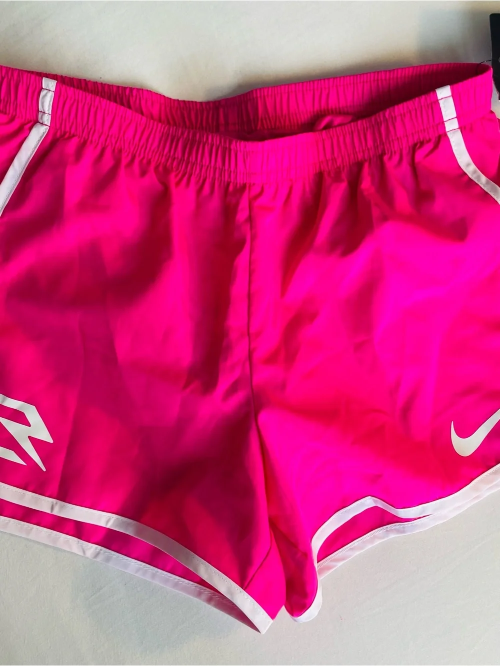 Nike Girls, Size Medium, Hot Pink Running Shorts with White Outline